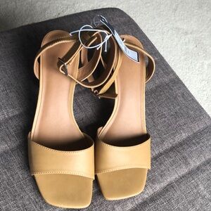 Tan sandals, never worn. Size 11 target brand.